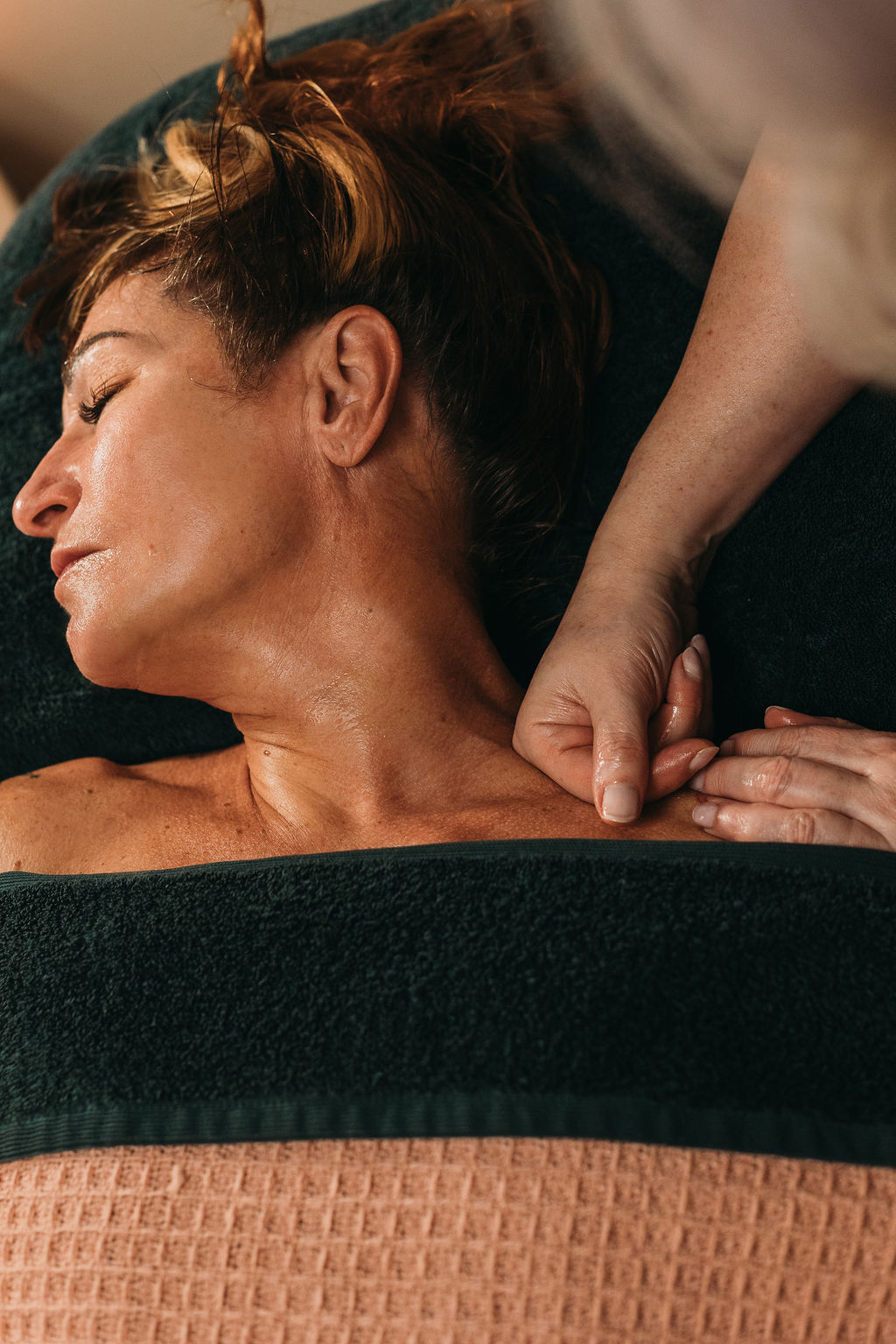 Image of neck & shoulder massage for vagus nerve, nervous system reset in perimenopause, menopause and post-menopause